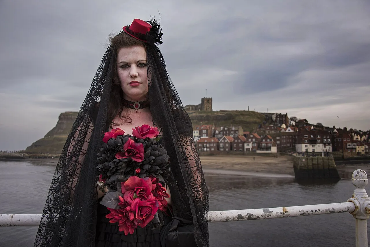 Adults wearing gothic fashion at a public event